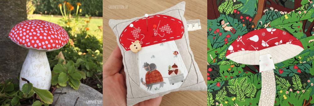 Drei genähte Fliegenpilze